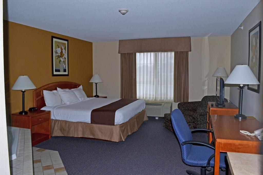 Paola Inn And Suites Habitación foto